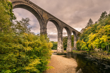 Lambley Viaduct in the South Tyne Valley  The Lambley Railway Viaduct was built in 1852 and towers over the River South Tyne in Northumberland. There are nine arches which support a deck 32 metres above the riverの写真素材