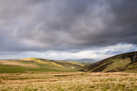 Cheviot Hills at source of River Coquet - The River Coquet winds its way through Coquetdale Valley in the Cheviot Hillsの写真素材