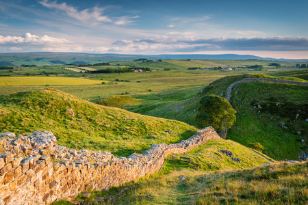 Hadrian's Wall above Steel Rigg, which is a World Heritage Site in the beautiful Northumberland National Park. Popular with walkers along the Hadrian's Wall Path and Pennine Wayの写真素材