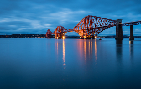 Forth Railway Bridge at Night, which is a cantilever railway bridge across the Firth of Forth in Scotland, west of Edinburgh City Centreの写真素材