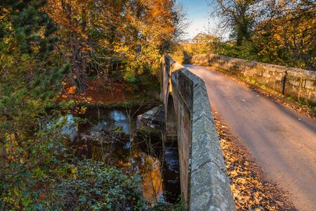 Mitford Bridge over River Wansbeck, the river rising in the Northumberland hills above Sweethope...