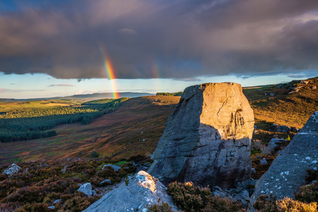 Drake Stone and Rainbow, at Harbottle in Northumberland which is a huge 30 feet tall sandstone...