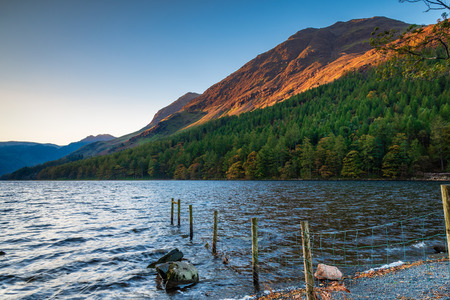 Golden Light on High Stile Fells above Buttermere, a lake in the English Lake Districtの写真素材
