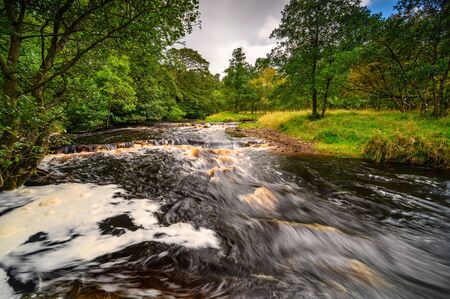 River West Allen north of Ninebanks, where much of the riverside is heavy woodland after leaving the...