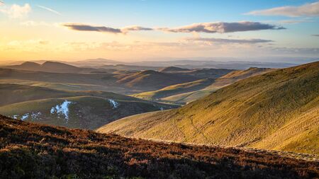 View into Scotland from the Pennine Way, at Brownhart Law, a summit on the line of the Scottish -...