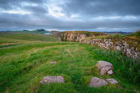 Peel Crags at Steel Rigg and Hadrians Wall, a UNESCO World Heritage Site in the beautiful Northumberland National Park, popular with walkers along the Hadrian's Wall Path and Pennine Wayのeditorial素材