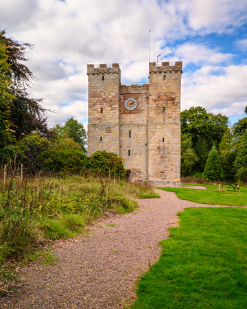 Preston Pele Tower in portrait, a 14th century bastle of medieval construction located in Northumberland and was a fortified dwelling for protection against the Border Reiversの写真素材