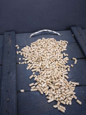 wood  pelletson a trap door  in a wood storeの写真素材