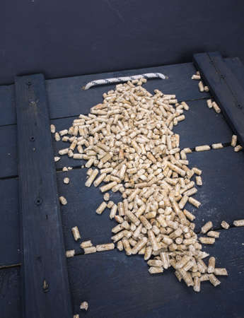 wood  pelletson a trap door  in a wood storeの写真素材