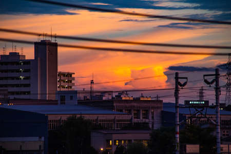 Sunset after a thunderstorm from a balcony in Yamato, Japanの写真素材