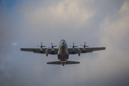 A Japanese Self Defense Force C-130 Transport takes off from Naval Air Station Atsugi, an air base shared by the JSDF and the US Navy located in Kanagawa Prefecture, Japan.  This aircraft was practicing take-offs and landings at the time of this photo.の写真素材
