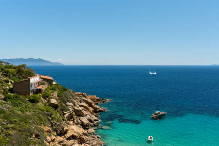 The magical colors of the water in isola del giglioの写真素材