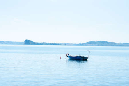 Boat in bolsena lake lazio italyの写真素材
