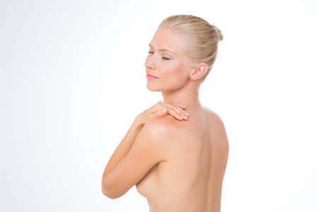 beautiful lady finds relief for her backの写真素材