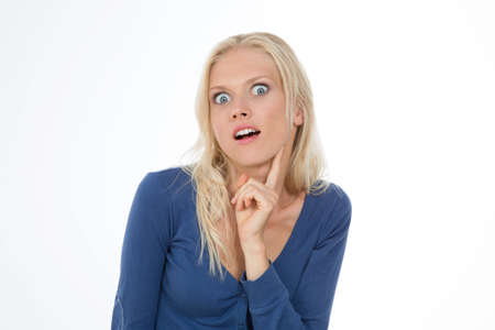 pretty and beautiful girl with astonished expressionの写真素材