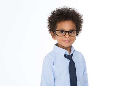 little boy with eye glasses and tie isolated on white backgroundの写真素材