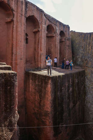 Lalibela, Ethiopia - August 20, 2020: Believers on the Church stone stairs in African townのeditorial素材
