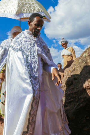 Lalibela, Ethiopia - August 20, 2020: Pilgrims going to the Church for pray in African townのeditorial素材