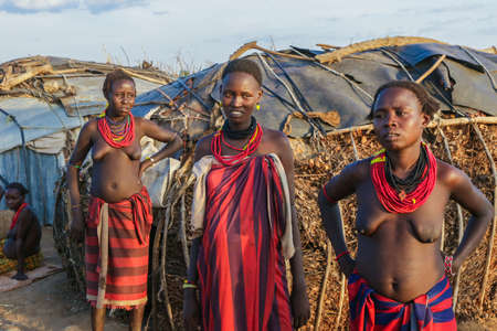 Omo River Valley, Ethiopian -November 30, 2020: Dassanech Tribe Woman with Traditional Bright Necklace in the Local Villageのeditorial素材