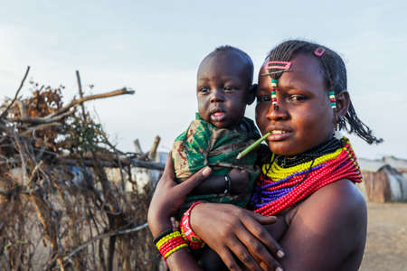 Omo River Valley, Ethiopian -November 30, 2020: Dassanech Tribe Woman in Traditional Bright Necklace...