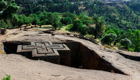 Main View to the Church of Saint George, one of many churches hewn into the rocky hills of Lalibela, Ethiopiaのeditorial素材