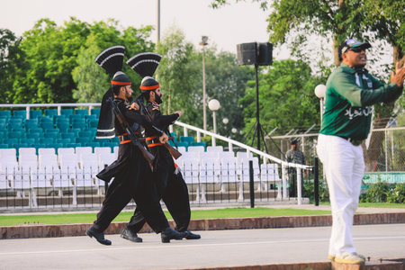 Wagah Border, Pakistan - July 22, 2021: Pakistan Soldiers in Bright Military Uniform on the Wagah Attari Border Showのeditorial素材