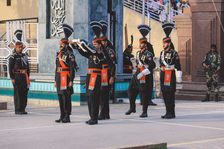 Wagah Border, Pakistan - July 22, 2021: Pakistan Soldiers in Bright Military Uniform on the Wagah Attari Border Showのeditorial素材