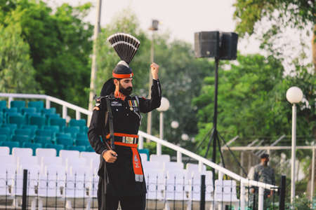 Wagah Border, Pakistan - July 22, 2021: Pakistan Soldiers in Bright Military Uniform on the Wagah...