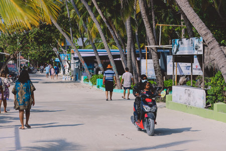 Maafushi, Maldives - June 25, 2021: Daily life of Local Maldivian People on the Maafushi Streetsのeditorial素材
