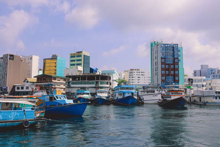 Male, Maldives - June 25, 2021: Colorful Boats and Ships in the Maldivian Blue Water Marina of the Male Cityのeditorial素材
