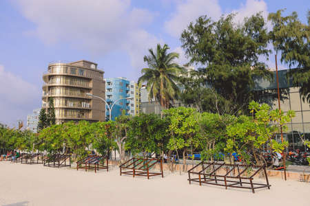 Male, Maldives - June 25, 2021: Sunny Day View on the Maldivian Beach Promenade in the Male City