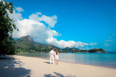 Romantic couple on the paradise tropical beaches of Seychellesの写真素材