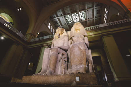Cairo, Egypt - November 02, 2021: Big Stone Ancient Egyptian statues in the Cairo Egyptian Museum,...