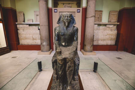 Cairo, Egypt - November 02, 2021: Big Stone Ancient Egyptian statues in the Cairo Egyptian Museum,...