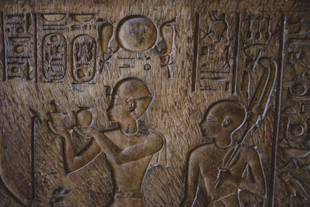 Cairo, Egypt - November 02, 2021: Interesting Ancient Paintings and Engravings with Hieroglyphics symbols in the Cairo Egyptian Museum, the oldest archaeological museum in the Middle Eastのeditorial素材