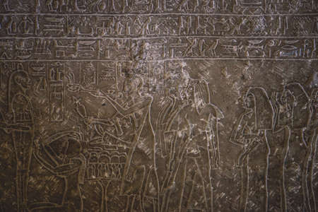 Cairo, Egypt - November 02, 2021: Interesting Ancient Paintings and Engravings with Hieroglyphics symbols in the Cairo Egyptian Museum, the oldest archaeological museum in the Middle Eastのeditorial素材