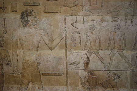 Cairo, Egypt - November 02, 2021: Interesting Ancient Paintings and Engravings with Hieroglyphics symbols in the Cairo Egyptian Museum, the oldest archaeological museum in the Middle Eastのeditorial素材
