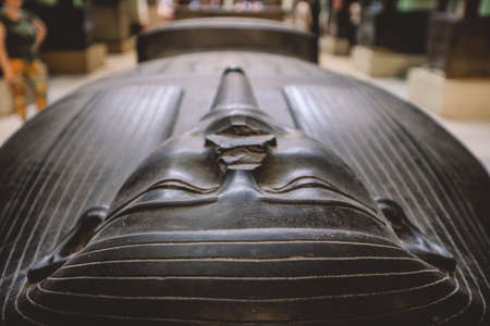 Cairo, Egypt - November 02, 2021: Majestic Ancient Sarcophagus with Hieroglyphics symbols in the...