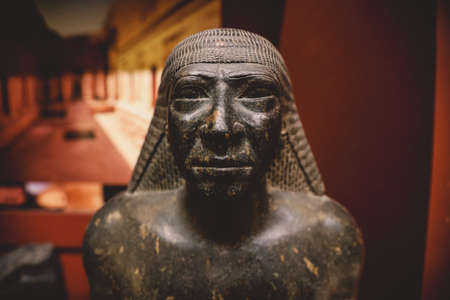 Cairo, Egypt - November 02, 2021:  Close up view to the Ancient Stone Statues in the Cairo Egyptian Museum, the oldest archaeological museum in the Middleのeditorial素材
