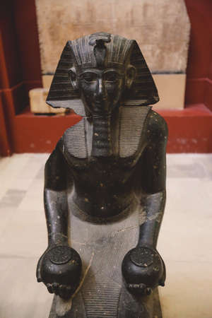 Cairo, Egypt - November 02, 2021:  Close up view to the Ancient Stone Statues in the Cairo Egyptian Museum, the oldest archaeological museum in the Middleのeditorial素材