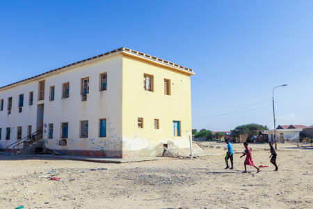 Berbera, Somaliland - November 10, 2019: Living Houses and Different Buildings on the Empty Berbera City Streetsの写真素材