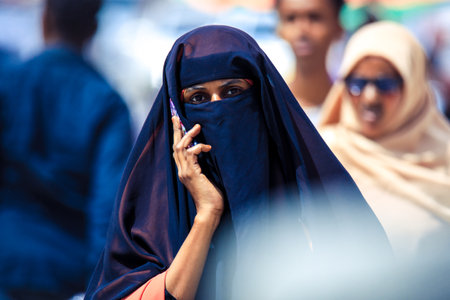 Hargeisa, Somaliland - November 10, 2019: Muslim Woman in Hijab walking on the Capital Streets