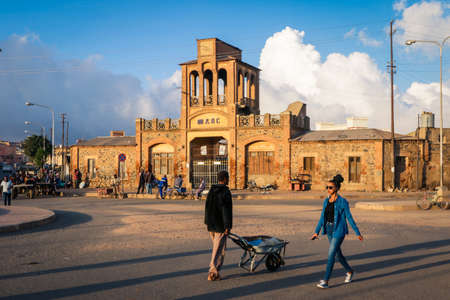 Asmara, Eritrea - November 01, 2019: Local People near the Medebar Market in the Asmara City Centerのeditorial素材