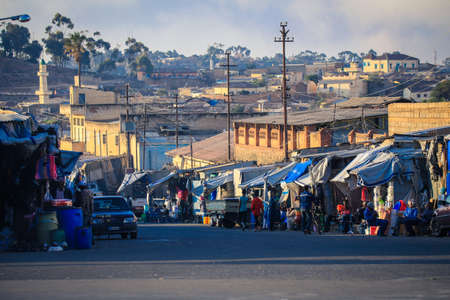 Asmara, Eritrea - November 01, 2019: Local People near the Medebar Market in the Asmara City Centerのeditorial素材
