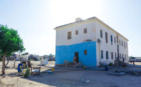 Berbera, Somaliland - November 10, 2019: Living Houses and Different Buildings on the Empty Berbera City Streetsのeditorial素材