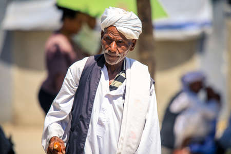 Keren, Eritrea - November 03, 2019: Local Eritrean Man in Traditional White dress on the Keren Camel...