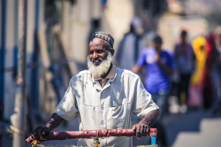 Keren, Eritrea - November 03, 2019: Local Eritrean Man in Traditional White dress on the Keren Camel animal Marketのeditorial素材