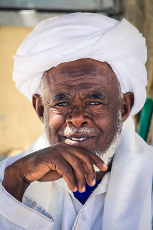 Keren, Eritrea - November 03, 2019: Local Eritrean Man in Traditional White dress on the Keren Camel animal Marketのeditorial素材