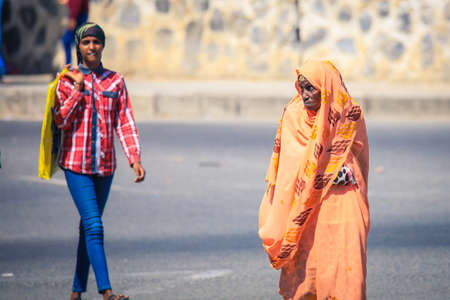 Keren, Eritrea - November 03, 2019: Muslim Woman in Traditional dress on the Keren streetのeditorial素材