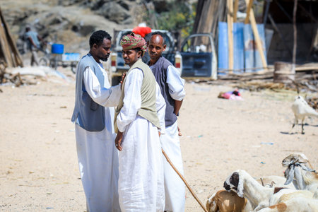 Keren, Eritrea - November 03, 2019: Local Eritrean People walking near the Fruit and Vegetable Keren Marketのeditorial素材